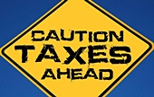 Caution road sign to symbolize investor tax issues