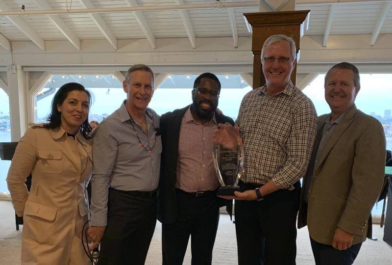 Online Trading Academy executives accept Dale Carnegie Training’s Leadership Award
